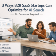 B2B SaaS team reviewing a marketing or search optimization strategy on a laptop.